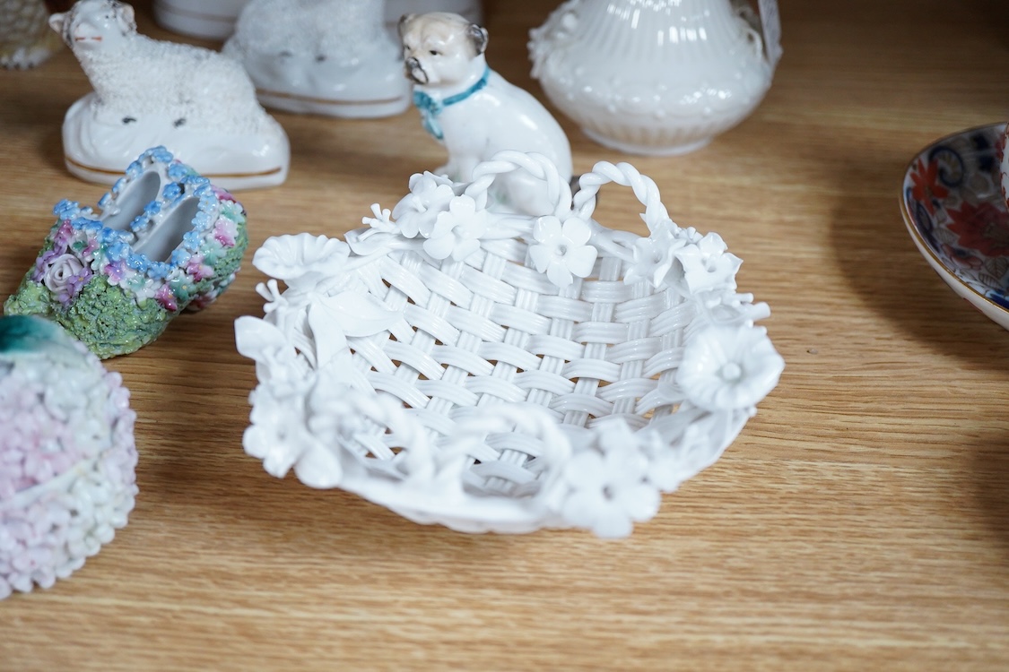 A pair of Worcester 'owl' candle snuffers, Staffordshire Zebra and two sheep, Belleek etc zebra 19cm wide.